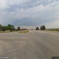 Dead deer causing traffic hazard on US 85