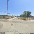 Person lying on railroad tracks at Del Mar and Spring