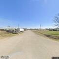 Woman acting strangely at 1st and Muskogee intersection