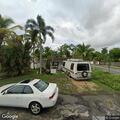 Person banging on door at Wilton Manors home