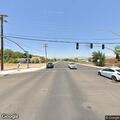Disabled truck with trailer blocking busy intersection