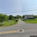 Traffic stop involving blue sedan and box truck