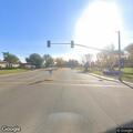 Traffic stop on black sedan with expired plates
