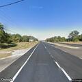 Person lying in traffic lanes on Orange Blossom Trail