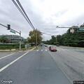 Unoccupied SUV blocking left turn lane