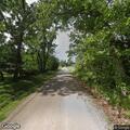 Metal debris from truck causes road hazard