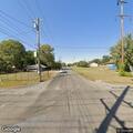 Officer follows gray sedan with broken tail light