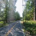 Tree partially blocking road on East Blue Hill Road