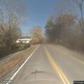 Tree partially blocking road on Delnath Drive