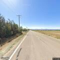 Man seen looking at truck on County Road 12