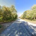 Report of tree on power line, no active fire