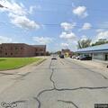 Traffic stop involving red Ford and white Nissan