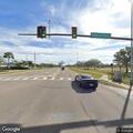 Traffic light flashing red and yellow at intersection