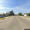 Vehicles blocking driveways near football game
