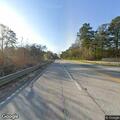 Person having difficulty breathing at highway intersection