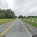 Traffic stop of gray Nissan Altima by high school