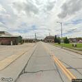 Loose dog near highway exit ramp