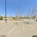 Person experiencing breathing problems in parking lot