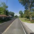 Tree partially blocking Main Street in Lovell