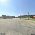 Traffic stop with tractor trailer at gas station