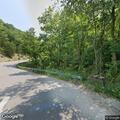 Woman injured in motorcycle crash by river path