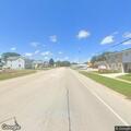 Officer contacts wanted person in vehicle