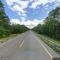Gray sedan possibly in ditch on Braggs Road