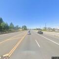 Disabled person walking at hazardous intersection