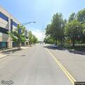Suspicious person near parked cars on Main Street