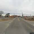 Railroad crossing arm stuck down at intersection