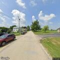 Small rekindle at prior structure fire site
