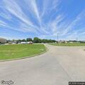 Suspicious person reported at hotel parking lot