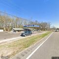 Man walking in middle of Highway 14 roadway