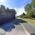 Traffic stop involving gray Ford and white GMC
