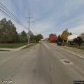 Semi trailer hits pickup truck in yard