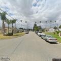 Suspicious person with skateboard on roof