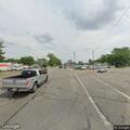 Traffic stop on red Chevy Impala at East Broadway