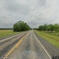 Tree blocking lane on FM 79 near Sumner