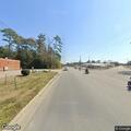 Glass debris blocking roadway on Doctor M.L.K. Jr Blvd