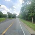 Unconscious man with labored breathing near West Saginaw Rd