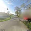 Three-car crash with fluid leak near trailer park