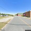 Suspicious person possibly stealing on Malloy Avenue