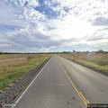 Grass fire in roadside ditch near Waltonville