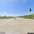 Roll of carpet on highway shoulder near bridge