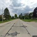 Traffic stop on red Subaru with Illinois plates