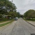 Officer with cooperative man carrying knife