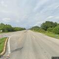 Traffic crash involving blue Rivian on US-1