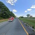 Stopped pickup truck on interstate shoulder