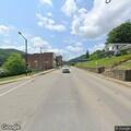 Motorcycle and car crash on East Main Street