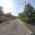 School bus hits stop sign at West Illinois and Thompson